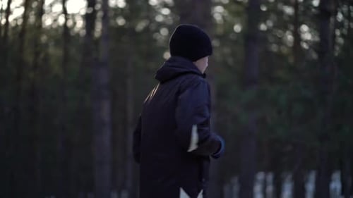 Child Running Through a Winter Forest