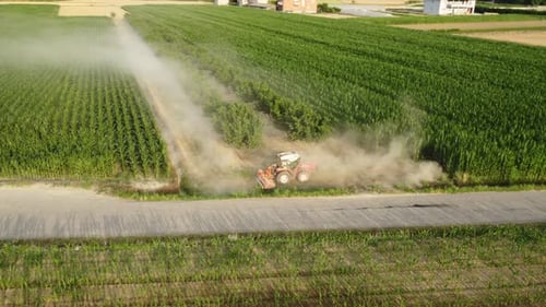 Aerial View of Tractor Working in Corn Field