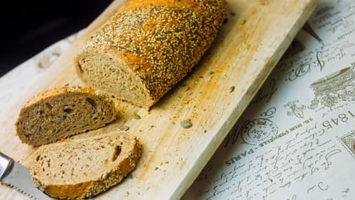 Sliced Seeded Whole Wheat Bread on Cutting Board
