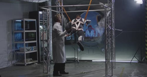 Scientist Prepares Subject in a Futuristic Laboratory