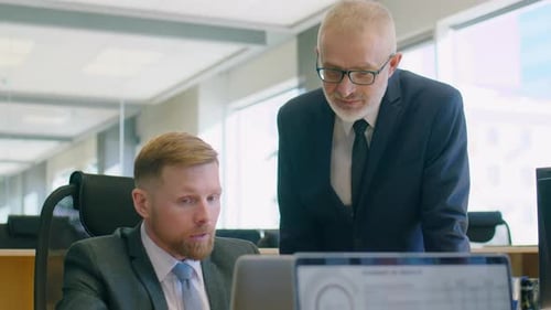 Office Worker Speaking with Senior Manager