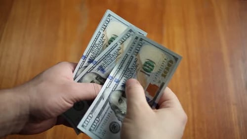 Counting Money: Hundred Dollar Bills Close Up