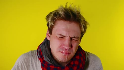 Man with Runny Nose and Cold Symptoms