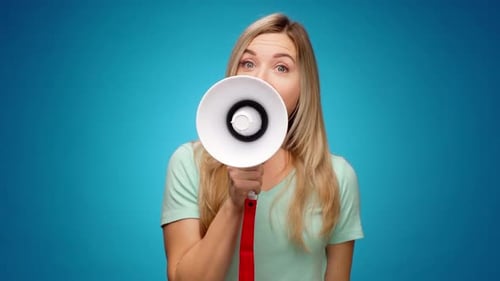 Woman Yelling into Megaphone on Blue Backdrop