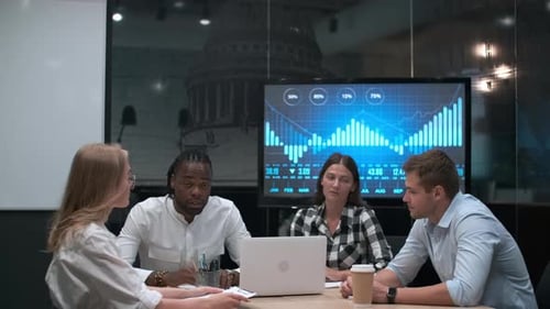 Young Adults Reaching Agreement During Business Meeting