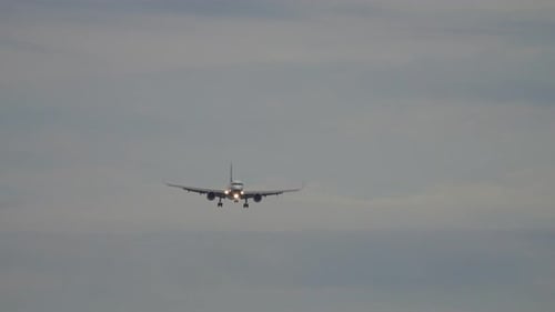 Passenger Airplane Before Landing at Morning