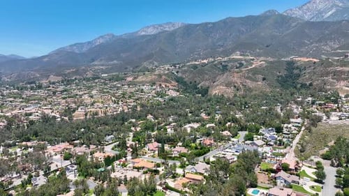 Aerial View of Wealthy Alta Loma Community and Mountain Range