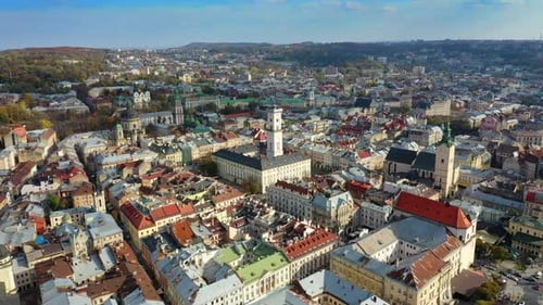 Aerial Drone Video of Lviv Old City Center - Roofs and Streets, City Hall Ratusha