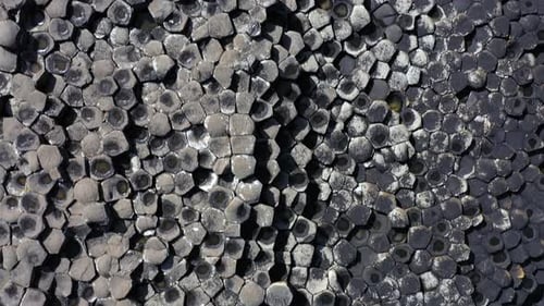 The Giants Causeway lies at the foot of the basalt cliffs along the sea coast on the north shores of