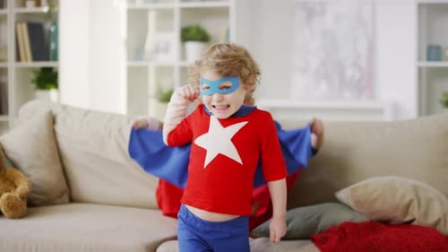 Young Children Play Together as Superheroes