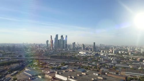 Moscow City Skyscrapers Through Sun Rays. Business Center of Moscow. Towers and Houses of the