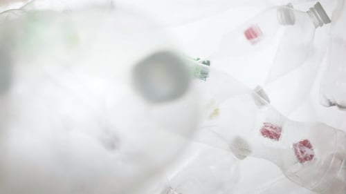 Floating Empty Used Plastic Bottles