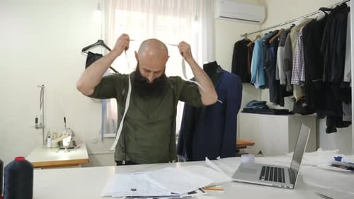 Tailor in his workshop