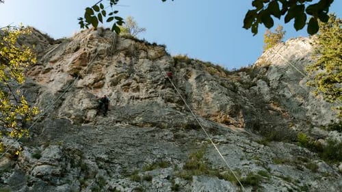 Rock Climber Climbing On A Rock 2