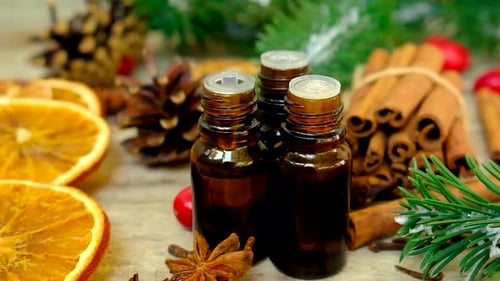 Christmas Essential Oils with Cinnamon and Dried Oranges
