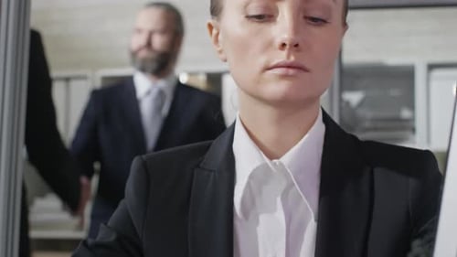 Attractive Businesswoman Working on Computer