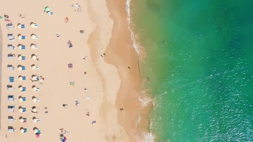 Yellowish Sand Surrounded with Turquoise Sea Waters As Seen From Above