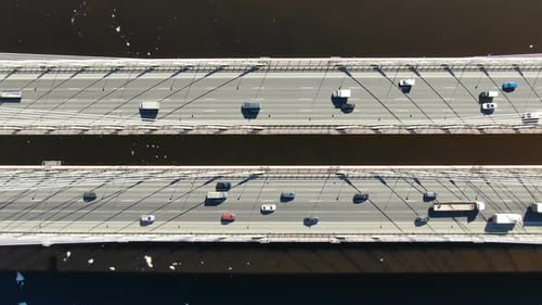 Aerial Shooting Over the Cable-stayed Bridge, Traffic of Cars Driving Over the Water