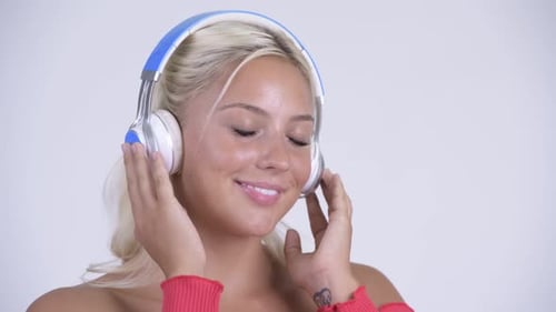 Woman Listening to Music with Headphones