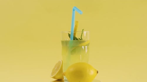 Lemonade Drink on Turntable with Blue Straw