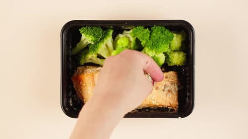 Seeds Added to Salmon with Broccoli