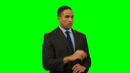 Businessman touching invisible screen