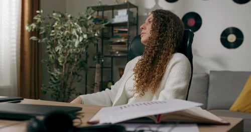 Pretty Focused Student Girl Reviews Many Documents Schedules Reports Prepares for Exam Works at Home