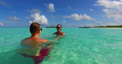 Happy people after marriage in love enjoy luxury on beach on clean white sand 4K background