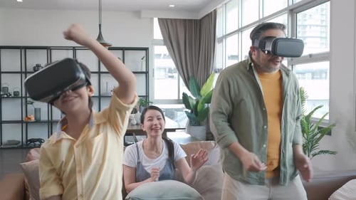 Family Plays VR Games Together in Living Room