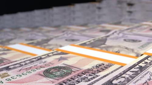 Many wads of money. 50 US dollar banknotes. Stacks of money.