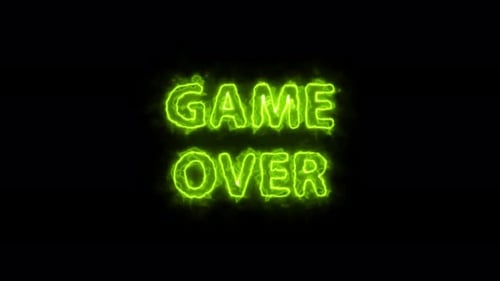 Game over neon letters glowing on a black background screensaver. Neon text close-up