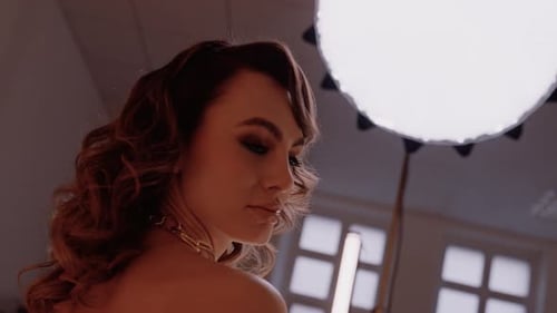 Elegant Young Woman Posing Indoors