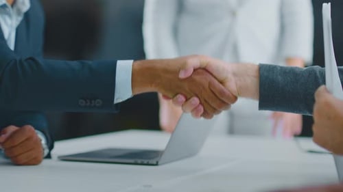 Business Handshake After Successful Meeting and Deal
