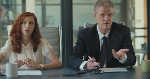 Business Colleagues Having a Discussion in Office