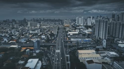 Slow Motion Traffic Road with Cars Trucks at Urban Street Aerial