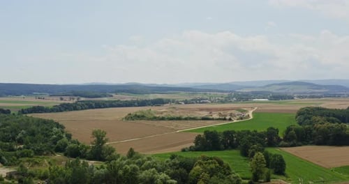 Aerial View of Rolling Farmland with Trees