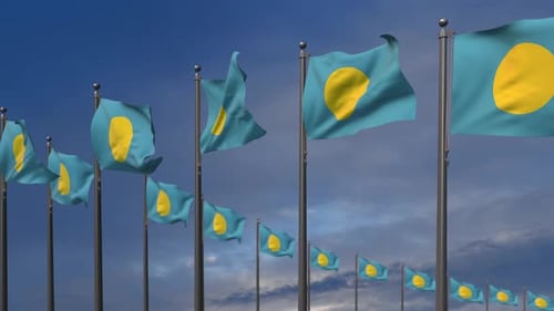 Palau Flags Waving in Wind with Blue Sky Background