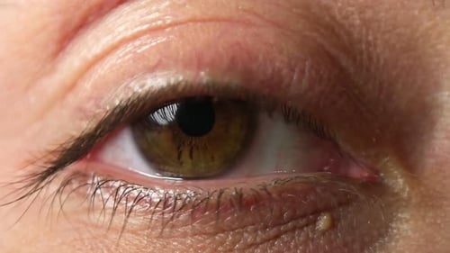 Close Up of Eye Opening Revealing Iris