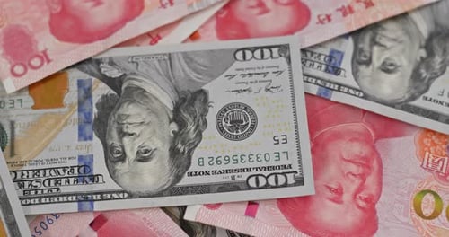 American Dollars and Chinese Yuan Close Up