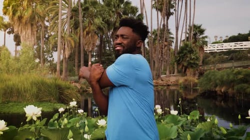 Athlete man working out in the park