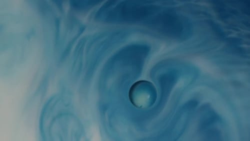 Swirling Blue and White Fluid Abstract