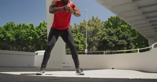 Man exercising in an urban setting