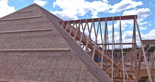 Panorama Top View of Closeup New Wooden Roof Beams Built Home Under Construction Under Framing