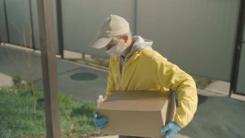 Delivery Man Brings Package to Woman's Home