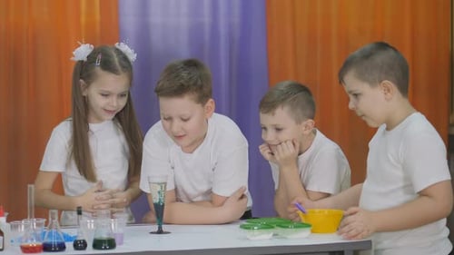 Children Doing a Science Experiment in Classroom
