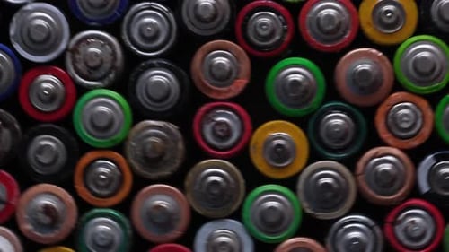Close Up of Positive Ends of AA Batteries of Electric Batteries and Accumulators AAA