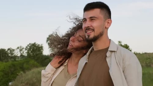 Couple Admiring View Of Landscape