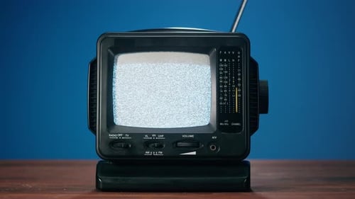 Vintage Television Set Displaying White Static