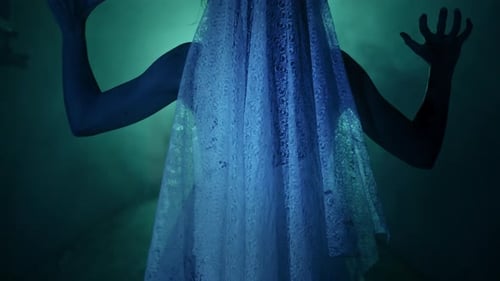 Eerie Woman in White Dress Raises Arms