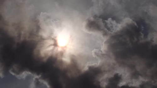Sun Covered By Black Clouds of Smoke